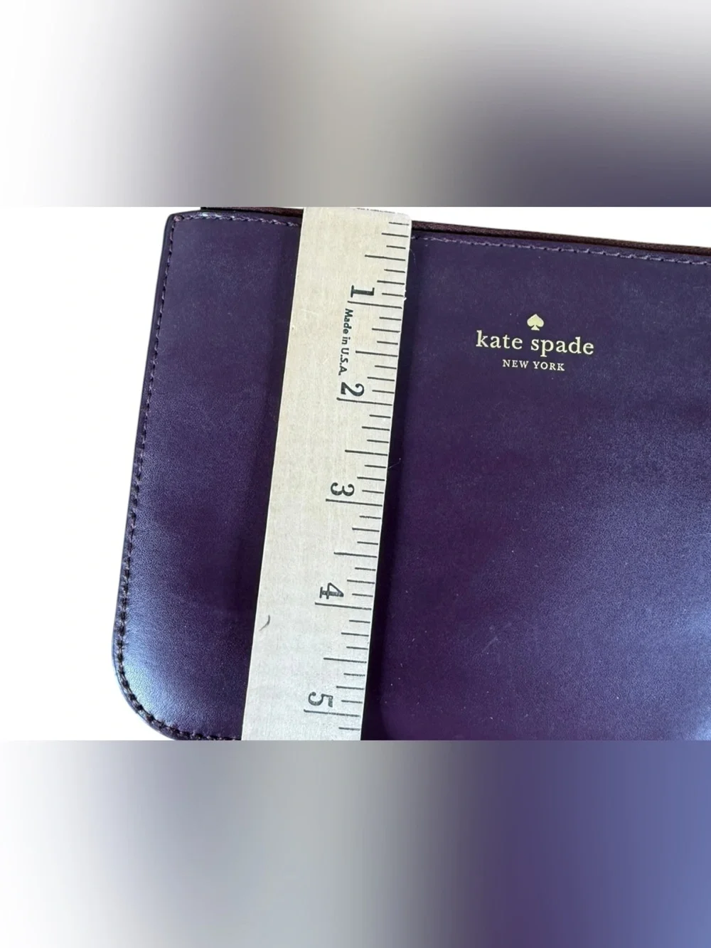 kate spade Purple leather wristlet with strap
